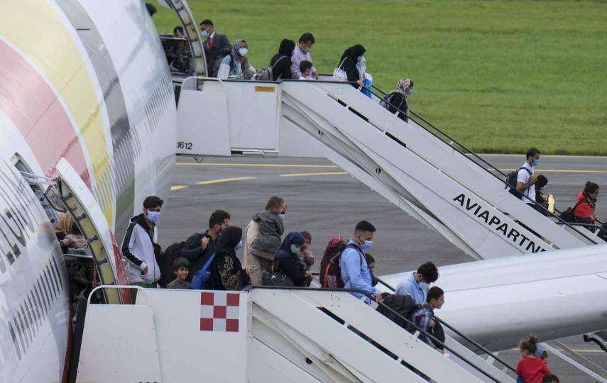Illustration picture shows people getting out of the plane at the arrival of a chartered Air Belgium airplane Airbus A340 carrying evacuated people from Afghanistan, at the military airport in Melsbroek, Belgium, Thursday 26 August 2021. 
