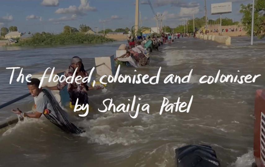 This image is the title card of a video that was made for a poem called The flooded, colonised and coloniser by Shailja Patel, a queer Kenyan feminist activist writer, author of Migritude. In the background we see a flooded area. People are holding on to what seems to be a hand rail while waters rush through them. 